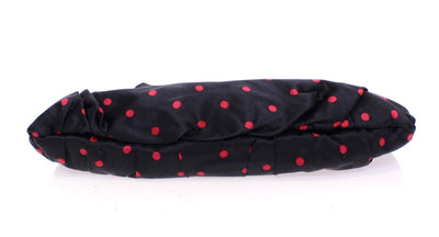Black polka dotted silk clutch