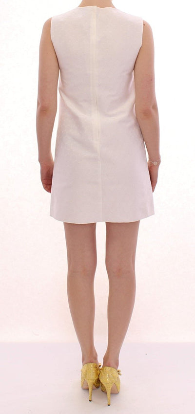 White polka dotted mini shift dress